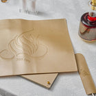 Regal Challah Board and Cover Set in cream linen with embroidered gold design, displayed with knife and cloth napkin on white surface.