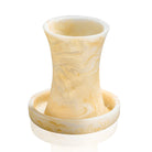 Elegant marble-patterned resin Kiddush cup with a matching drip tray, featuring cream and gold swirled textures.