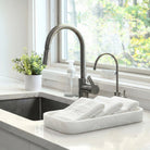 Resin Pesach towel box featuring a sleek marble look finish. A practical and stylish countertop accessory, perfect for keeping hand towels neatly displayed during Pesach.