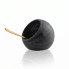 Black resin salt cellar with marble pattern on a white background - waterdale collection