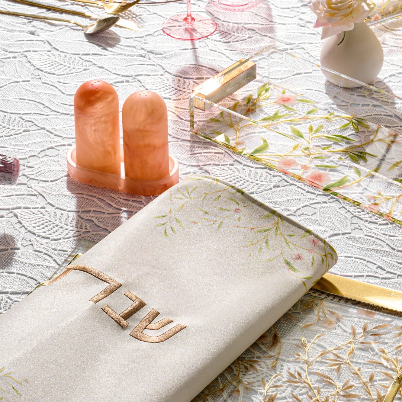 Pink marble-style resin salt shaker set with tray displayed on an elegant Shabbat table setting – Waterdale Collection