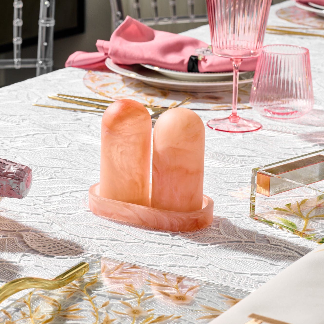 Pink marble-style resin salt shaker set with tray displayed on an elegant Shabbat table setting – Waterdale Collection