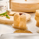 Beige marble-style resin salt shaker set with tray styled on an elegant Seder table setting – Waterdale Collection