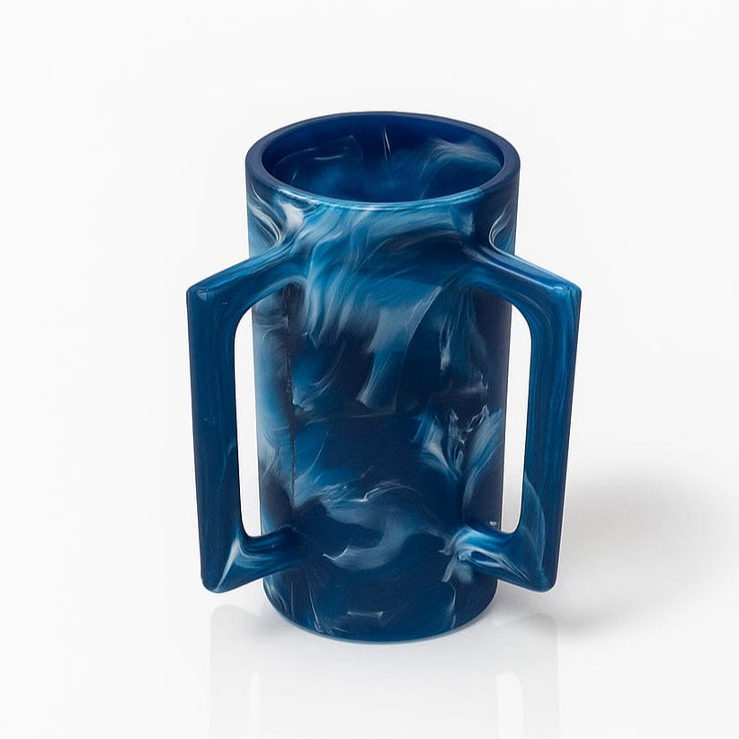 Blue resin washing cup with handles on a white background