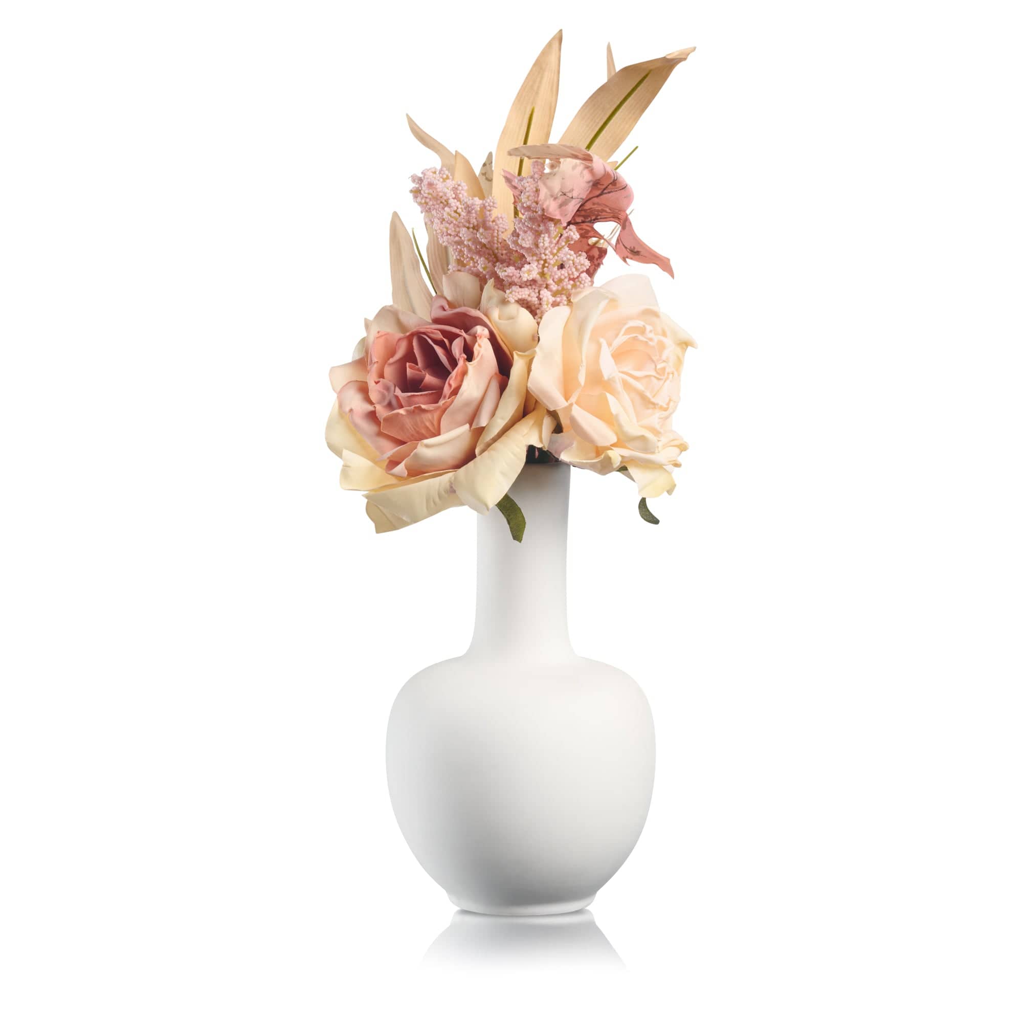 Rose faux floral arrangement in a white vase with blush and ivory artificial flowers.