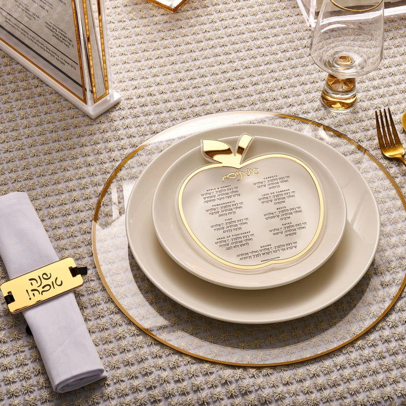 Rosh Hashana Classic Tablescape with cream plates, gold accents, and gray napkins on textured cream tablecloth