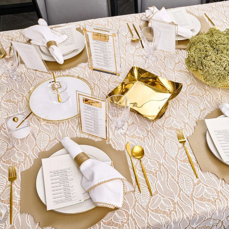 Rosh Hashanah Classic 2.0 tablescape with white plates, gold flatware, and geometric table runner on neutral linen.