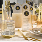 Arch Simanim card standing upright on a Jewish New Year table (ראש השנה)