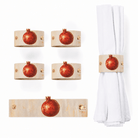 Painted pomegranate napkin wraps on a Rosh Hashonah place setting (ראש