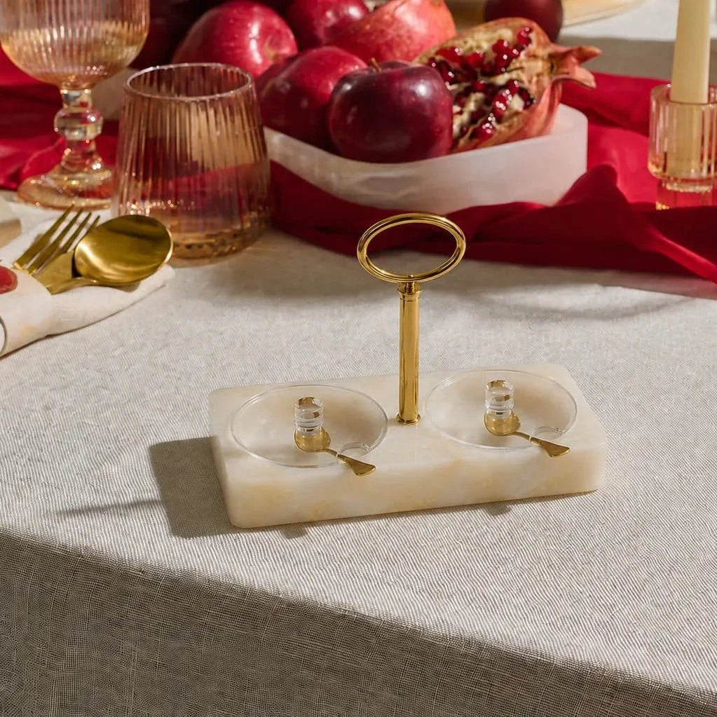 Marbled resin honey and salt dish on a Rosh Hashonah table setting