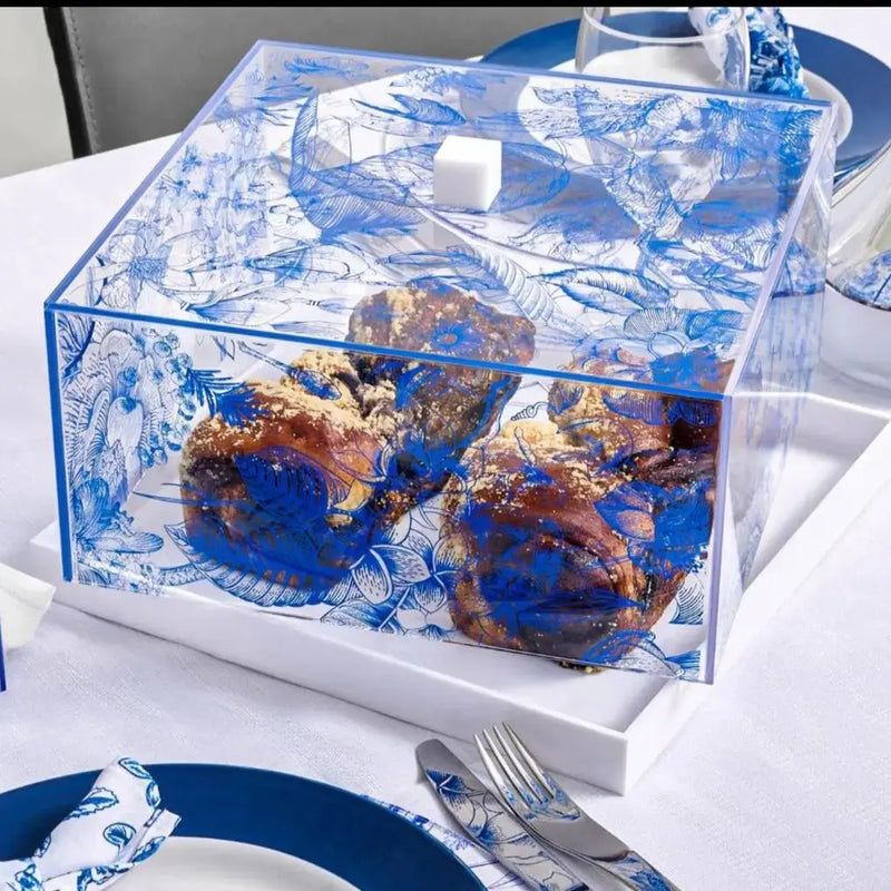 Shavuos French Toile 2024 tablescape with blue and white patterned acrylic centerpiece on formal place setting