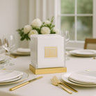 Square Zemiros Bencher Set for Shabbos & Yom Tov (Set of 10) displayed on an elegant dining table with gold flatware.