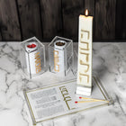 Waterdale Collection Suspended Havdalah Set displayed on marble with boxed spice tower, candle holder, and instruction card for Jewish ceremony.