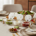 Waterdale Collection - Dinner table set with appetizers and a salad , a pearl marble dip holder in a home setting