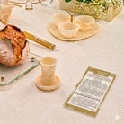Kiddush Yom Tov Card with swirl design on a shabbos table- Waterdale Collection