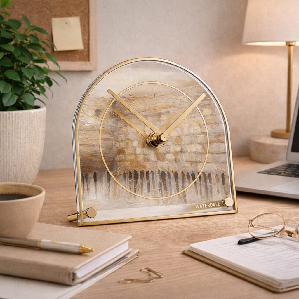 Taupe Kosel Decorative desk clock on a desk with a laptop, coffee cup, and glasses in the background - Waterdale Collection