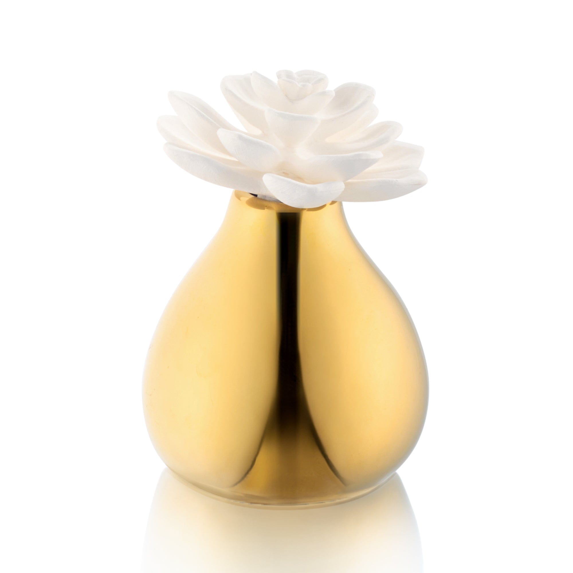 Minimalist clear glass teardrop fragrance vessel by Waterdale Collection, featuring a decorative silk flower diffuser for sophisticated Shabbat and holiday styling.