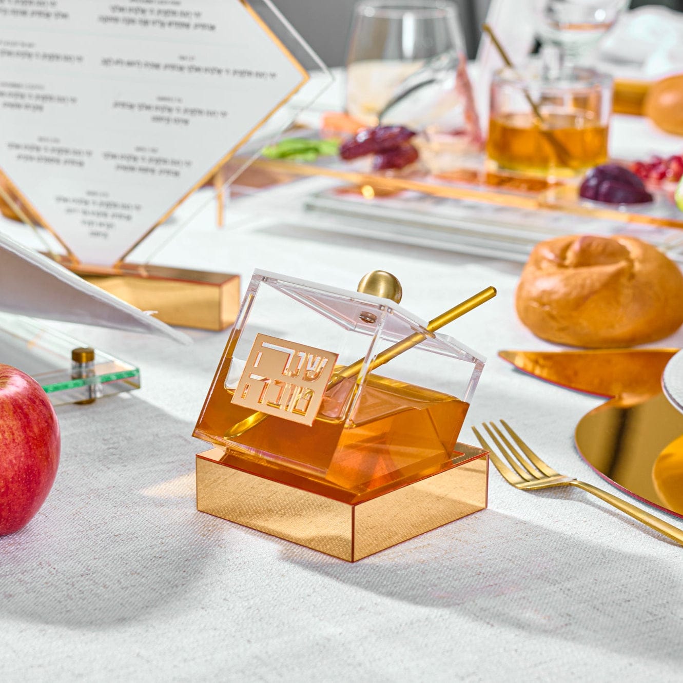 Gold Tilt Honey Dish on a table setting