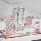 Watercolor Hadlokas Neiros Gift Box with floral pink acrylic Hadlakat Nerot prayer, tzedakah box, and match holder.